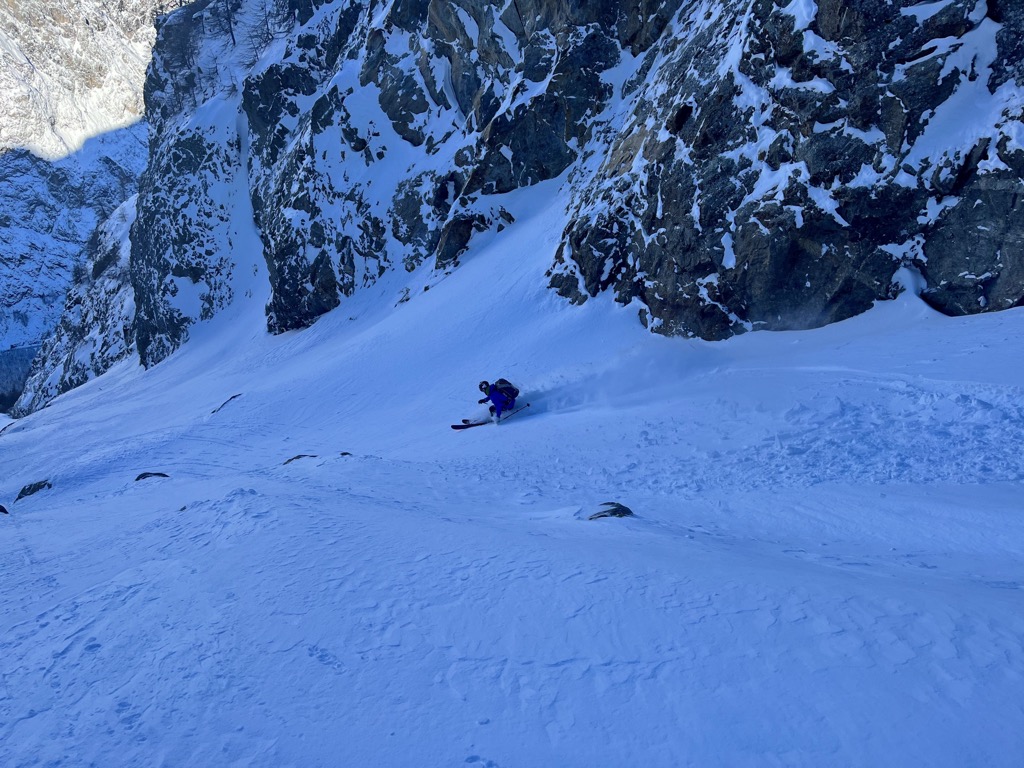 The Secrets to Finding the Best Snow Off-Piste. Couloirs come in many shapes and sizes; this one is wide open and perfect for big, arcing turns. Photo: Sergei Poljak