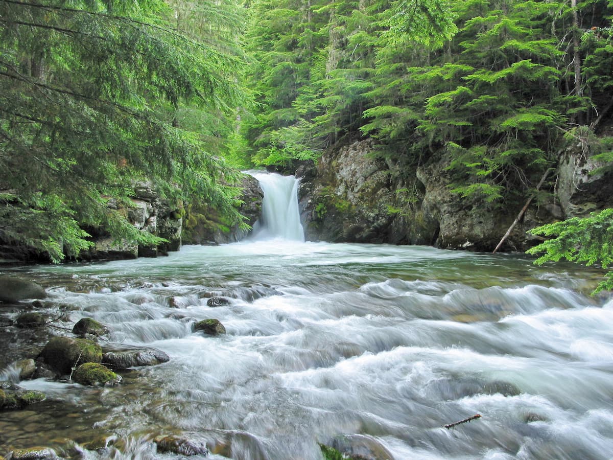 Melting snow from the Montana Cabinet mountains finds its way over Granite Creek falls.