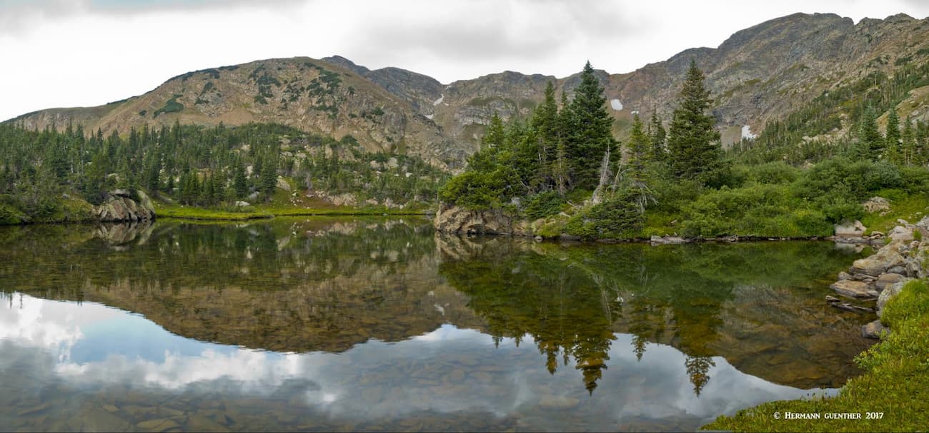 Scenic tarn below Upper Crater Lake. Continental Divide