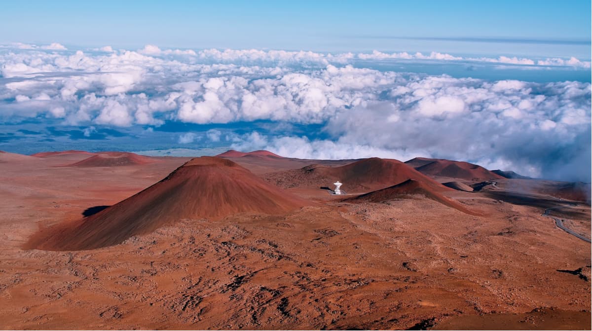 Extinct volcanic craters in background from Mauna Kea summit