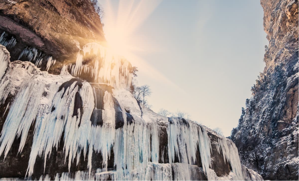 Frozen waterfall at sunset. Chegem gorge. Kabardino-Balkarian Highland State Reserve