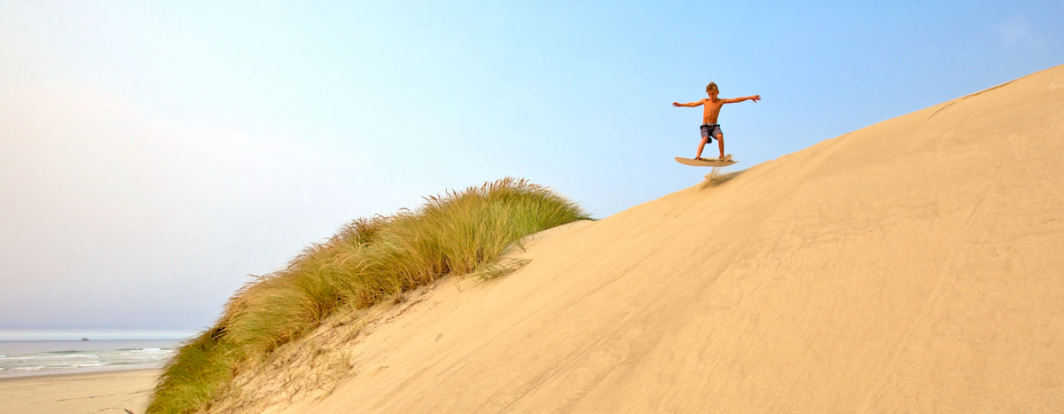 Sand boarding at  Oregon Dunes National Recreation Area