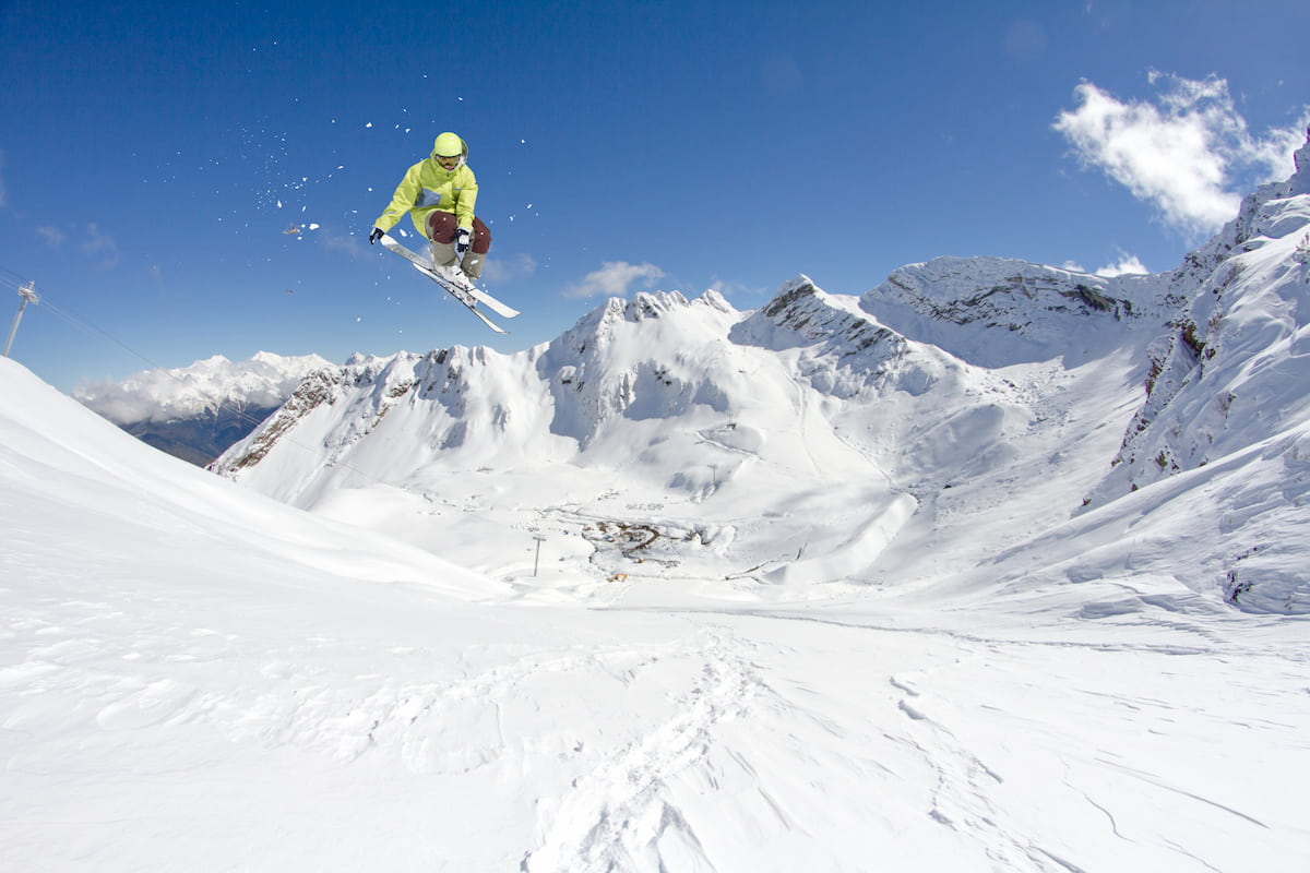 Flying skier on mountains. Skeena Mountains
