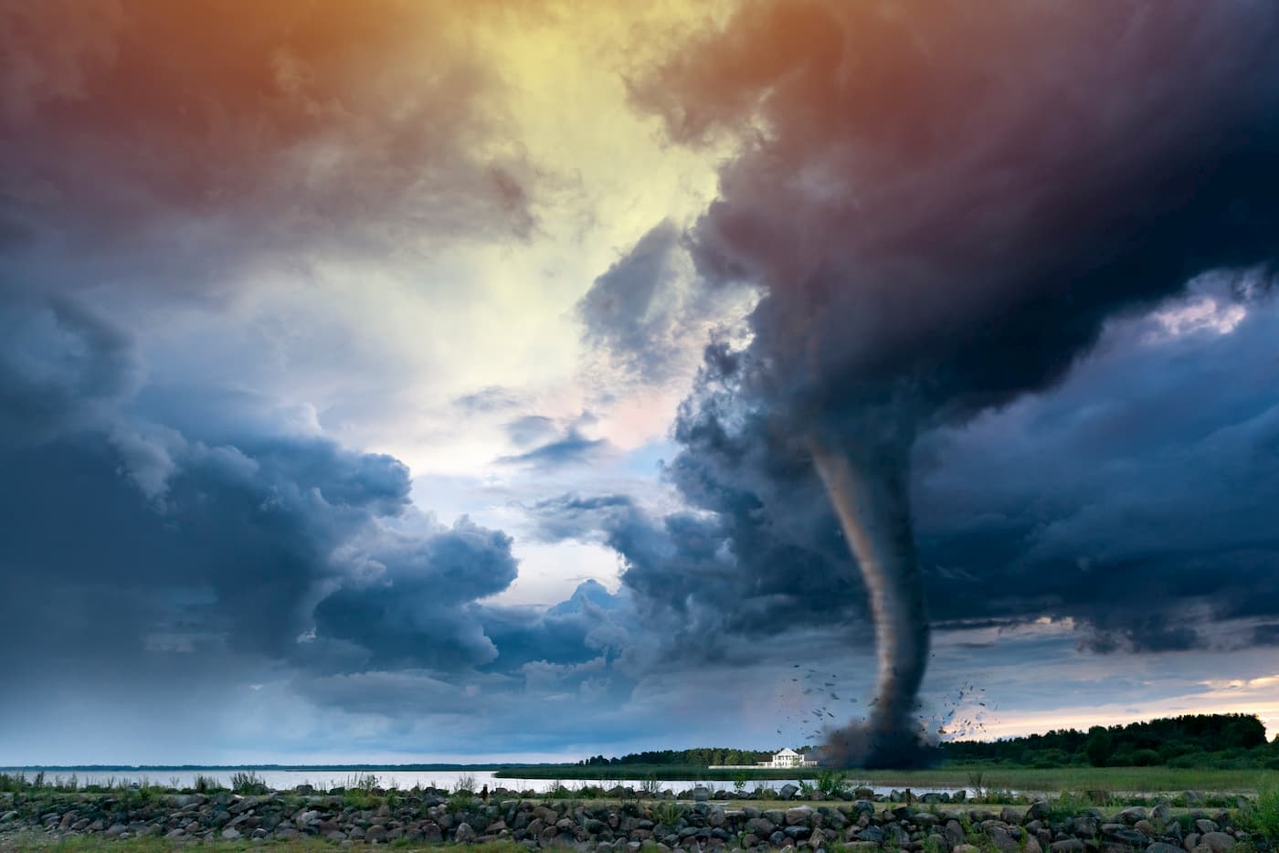 Super Cyclone or Tornado forming destruction over a populated landscape