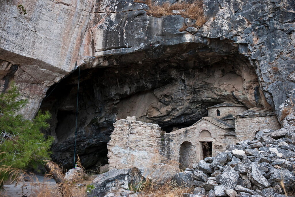 Ntavelis cave and the enclosed monastery. Mount Parnitha National Park, Greece