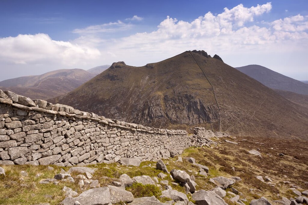 The Mourne Wall and the peak of Slieve Bearnagh in the Mourne Mountains, Northern Ireland