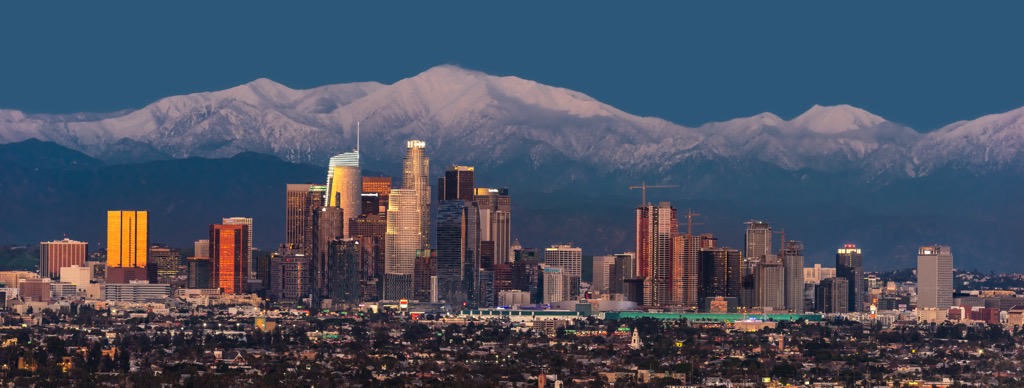 Downtown Los Angeles, with snowcapped Mount Baldy and the San Gabriel Mountains in the distance. Angeles National Forest