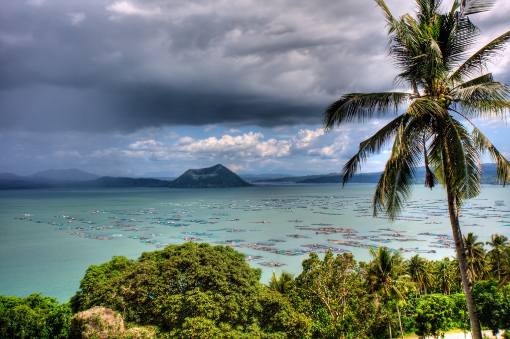 Taal Lake with a storm approaching. Batangas Mountains