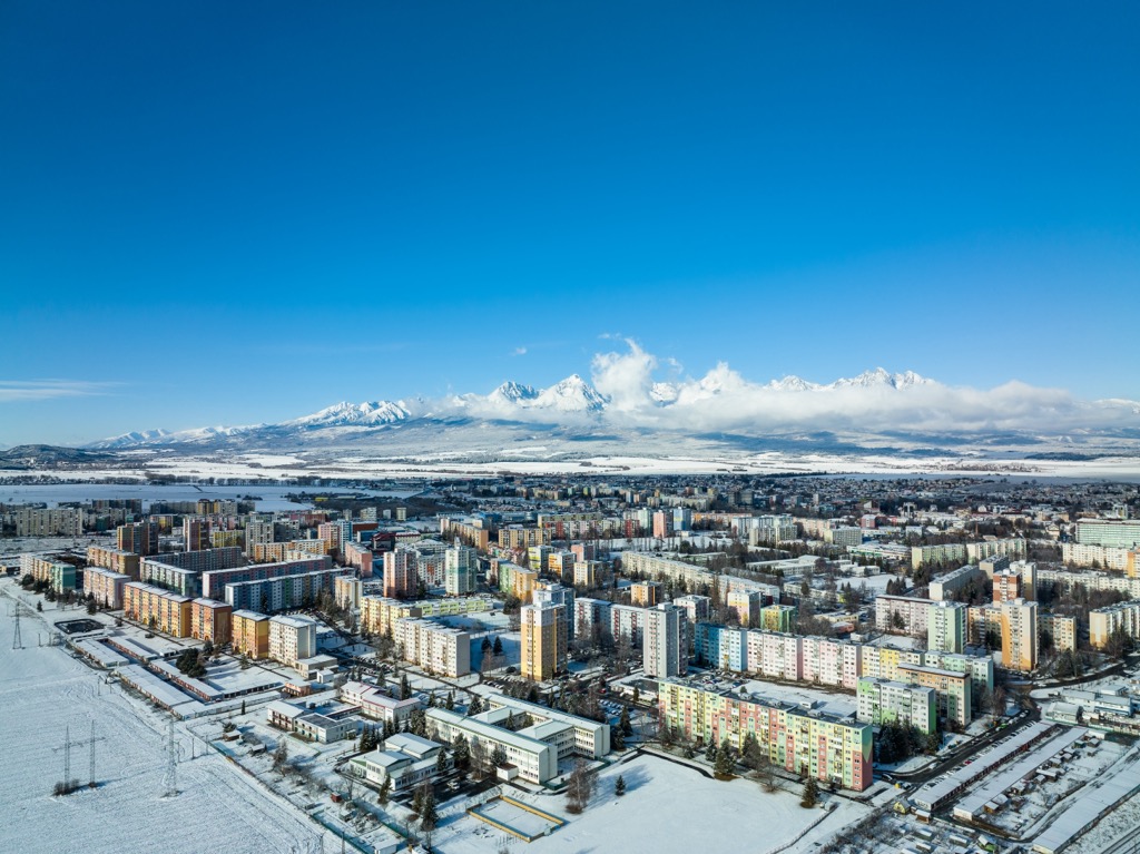 Poprad sits in the Poprad Basin, a valley surrounded by mountains. Belianske Tatry