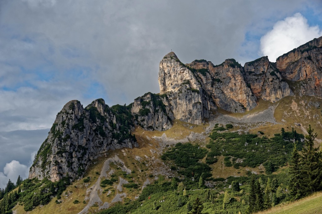 Rotspitze (2,067 m / 6,781 ft), with its summit cross visible on the central summit. Brandenberg Alps