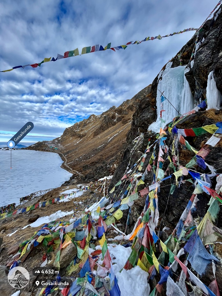 Tibetan lunga, or prayer flags, over Gosain Kund. Central Development Region