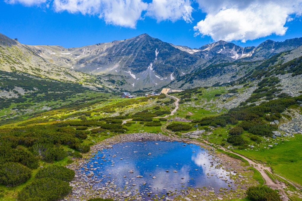 Musala. The buildings near the small lake are part of the Musala Hut. Central Rila Reserve