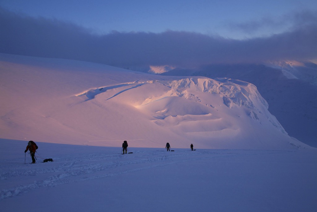 Ascending to 11K Camp on the Kahiltna Glacier at midnight. Denali