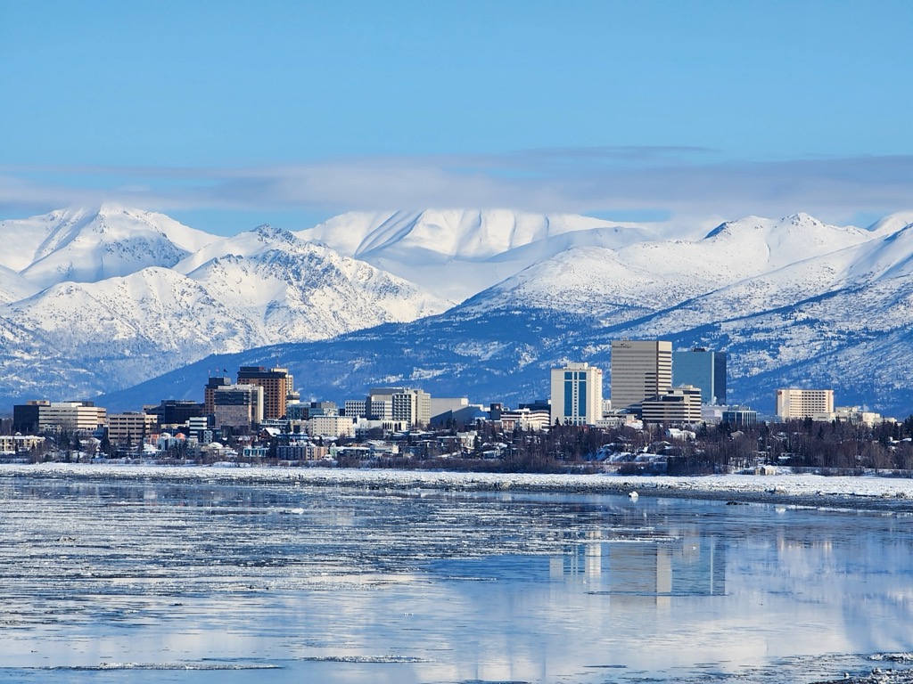 Anchorage, sitting in the shadow of the mighty Chugach Range. Denali