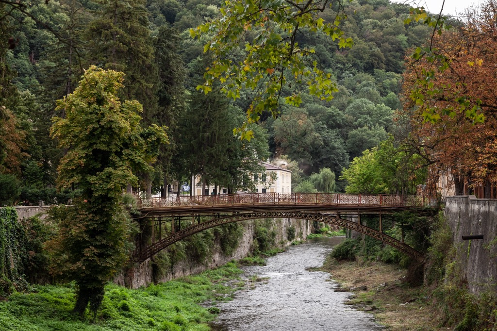 The cast iron footbridge over the Cerna River in the village of Baile Herculane. Domogled Valea Cernei