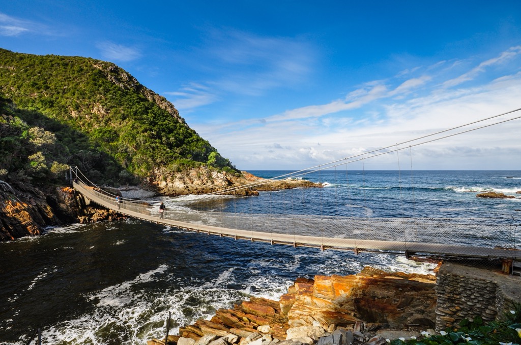 The famous suspension footbridge at the base of the Storms River is part of the Otter Trail. Eastern Cape