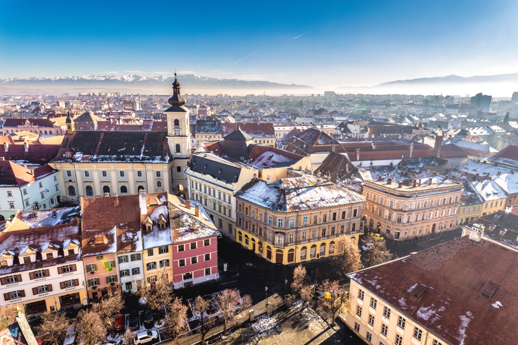 Sibiu, with the snow-covered Făgăraș Mountains visible in the background. Fagaras Mountains