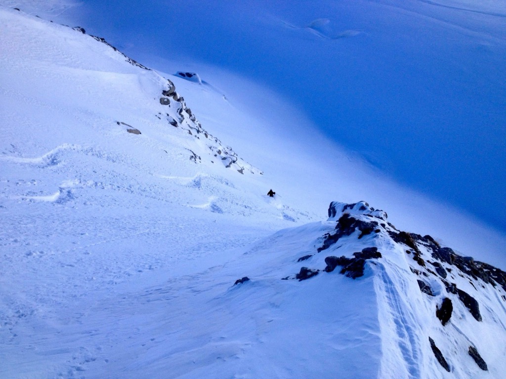 Anna finishes a descent down the Rognons Glacier. Photo: Al Lochhead. Grands Montets