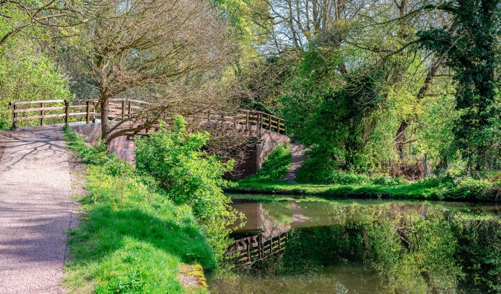 Grove Mill Footbridge (Bridge 166) across the River Gade in Cassiobury Park. Hertfordshire