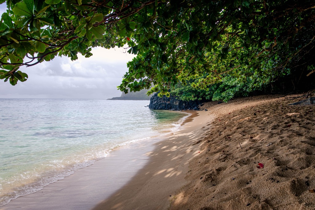 A beach tucked away along the coastline of Kauai. Kauai County