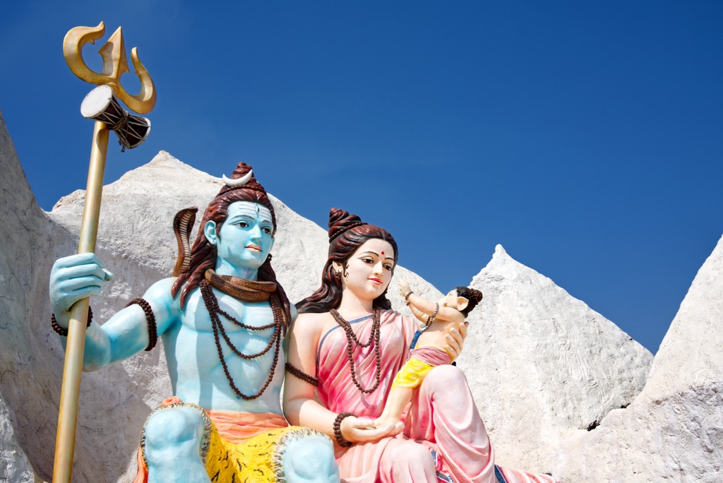A statue of Lord Shiva and Parvati at a temple near Pune, India. Khirganga National Park