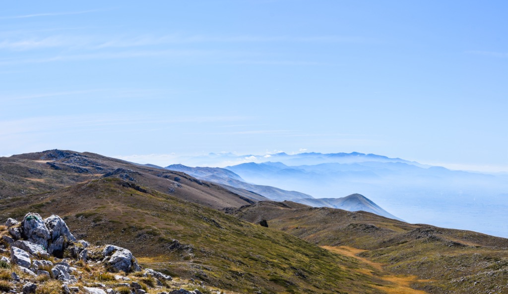 Views of the Mali i Thatë range, with the lakes obscured by fog. Lake Pogradec