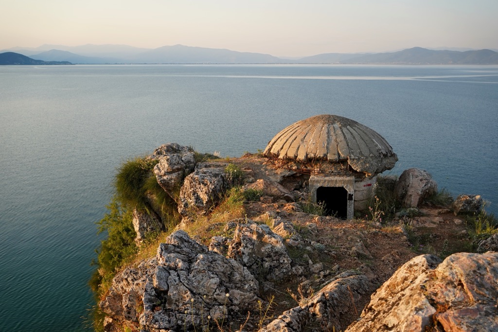 An old bunker over Lin village in Albania. Lake Pogradec