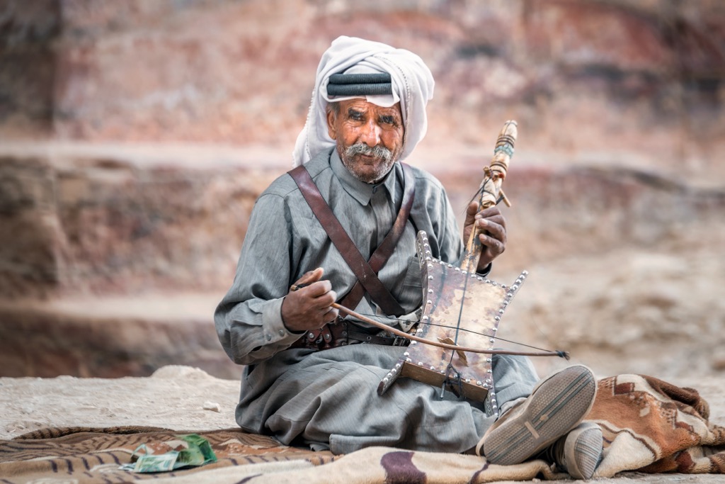 A Bedouin man playing a rabab (rabāba) near Petra, Jordan. Levant Ranges