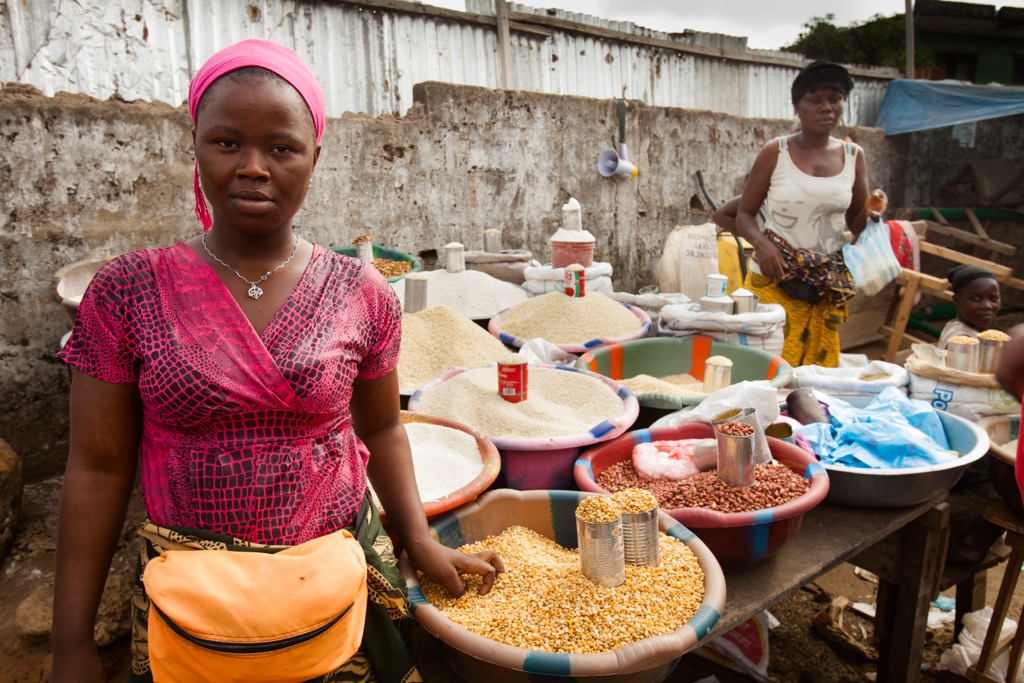 Women selling staples at the markets of Monrovia. Liberia Mountains