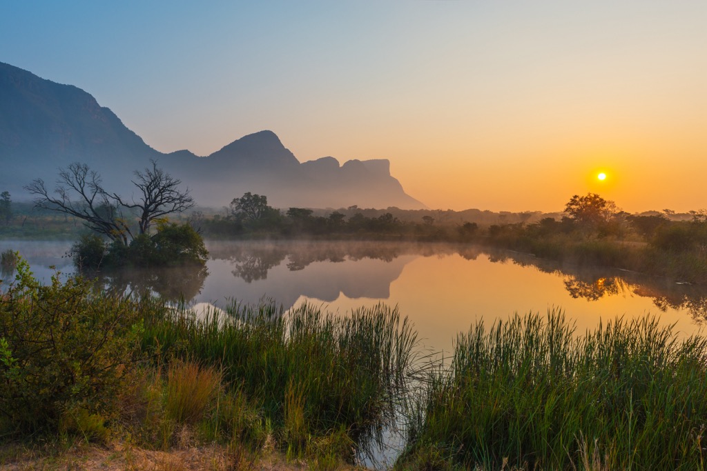 Sunrise in the Entabeni Safari Game Reserve with views of the Waterberg Mountains, a UNESCO Biosphere Reserve. Limpopo