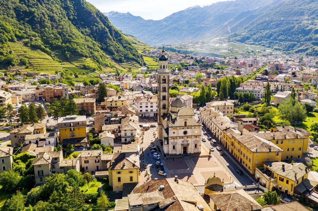 Tirano with the Basilica Madonna di Tirano visible. Livigno Alps