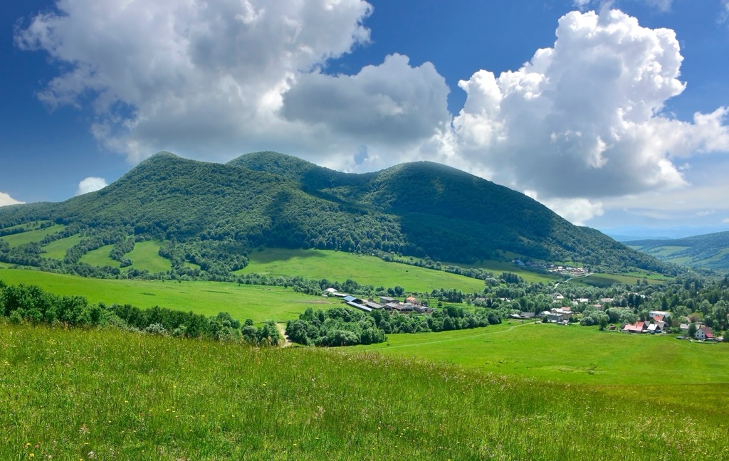 Typical human settlement in the Low Beskids features small villages with meadows for grazing livestock. Low Beskids