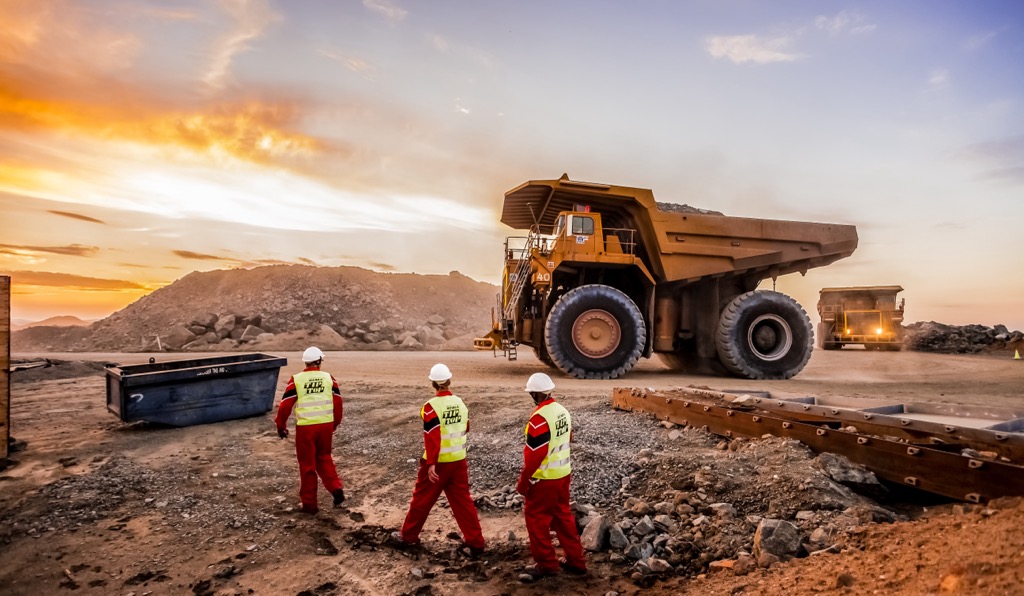 Dump trucks transporting ore at a Platinum mine in Rustenburg, South Africa. Magaliesberg