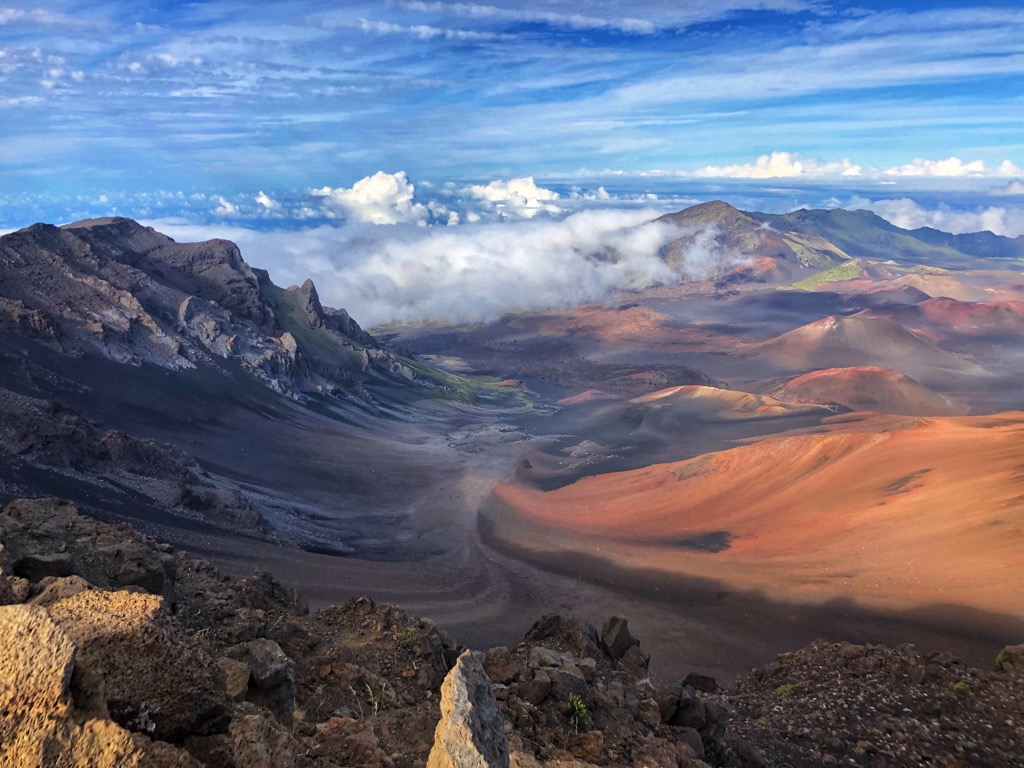 Gazing down from the summit of the dormant Haleakalā volcano. Maui County