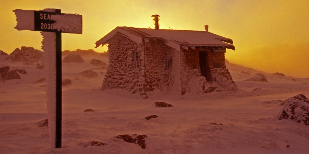 The Seaman’s Hut during a winter’s sunrise. Mountain Huts