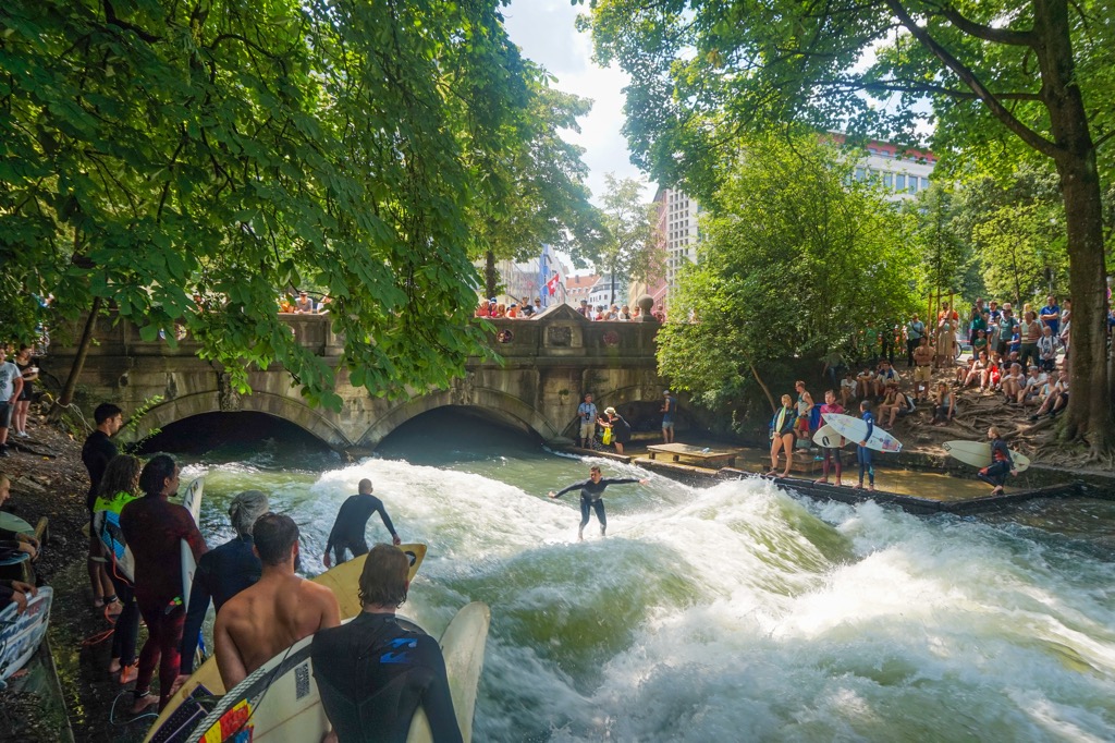 The artificial surf wave at the Englischer Garten. Munich Mountains