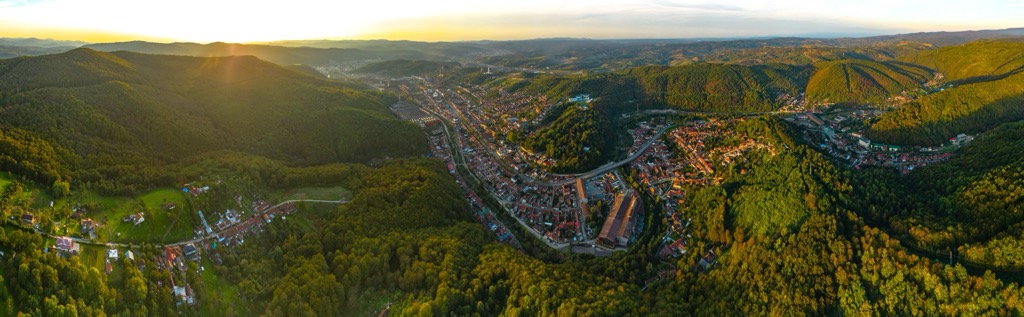 The nearby town of Reșița, Romania. Muntii Almajului Locvei