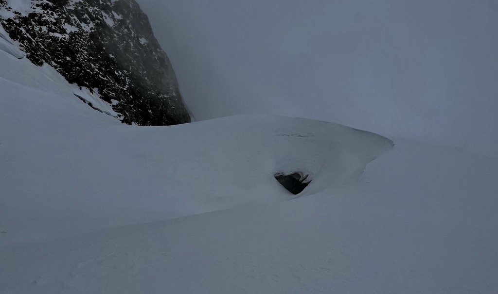 About 6 meters (20 ft) of snow are piled up on these crevasses. Photo: Sergei Poljak. Refuge d’Aigle