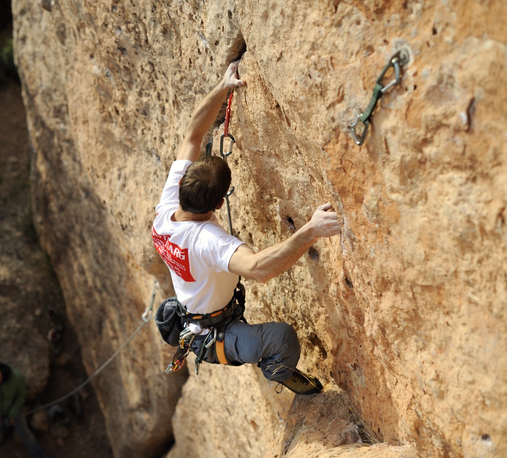 Leading a sport climb. Rock Climbing