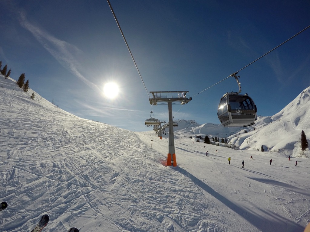 Chondola’s have both chairs and gondolas attached to the cable. Ski Arlberg