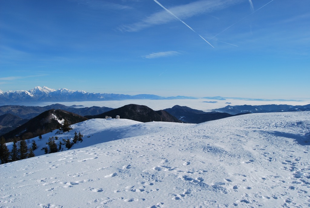 The summit of Blegoš with views of the Julian Alps. Slovene Prealps