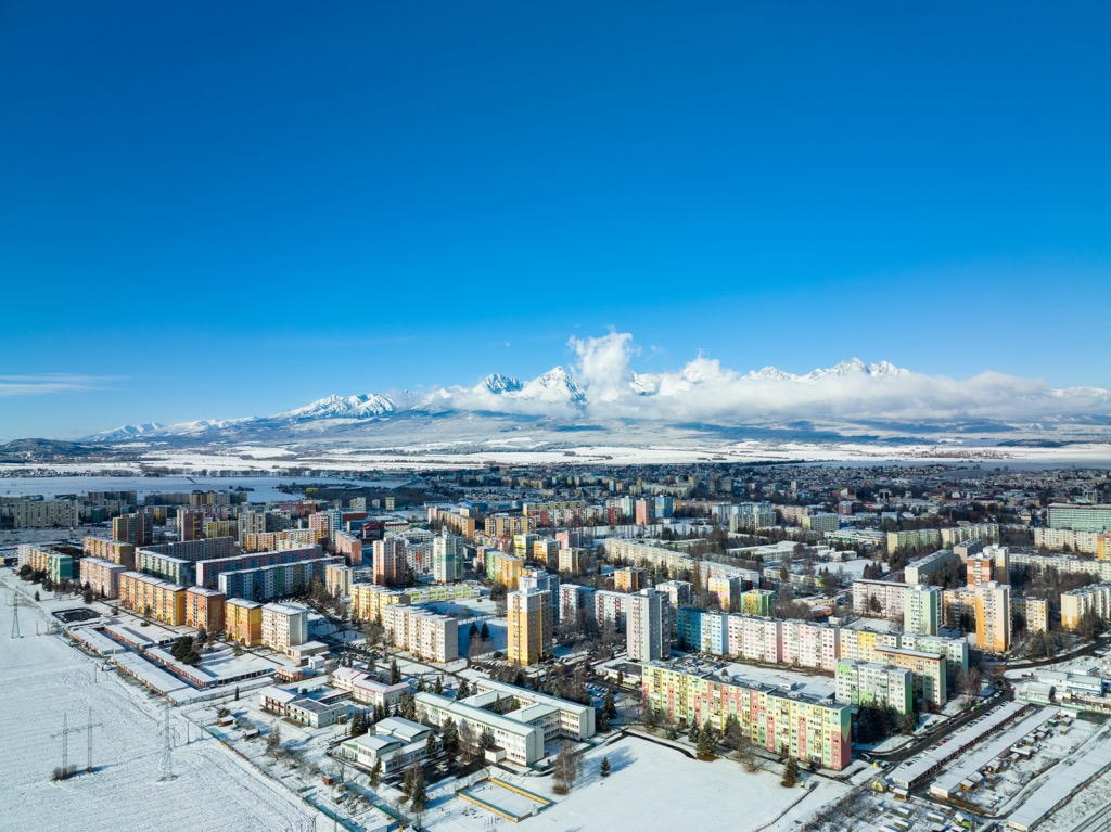 Poprad’s soviet apartment blocs with a backdrop of the Tatra Mountains. Ticha Dolina