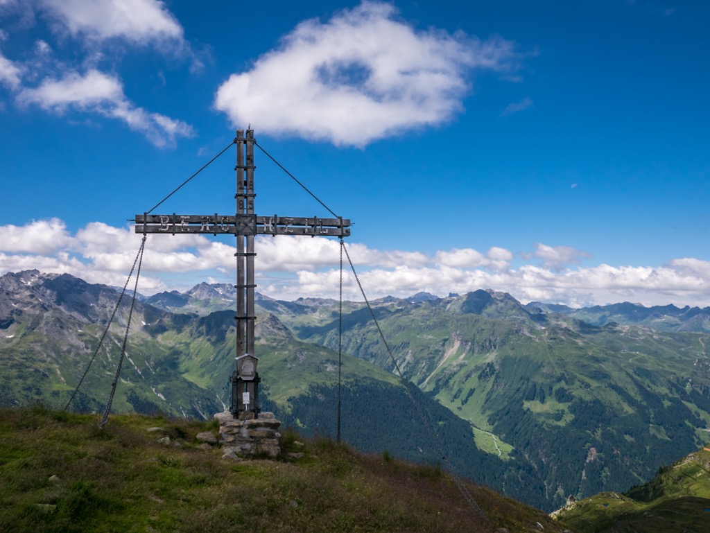 The summit cross atop Versalspitze (2,462 m / 8,077 ft). Verwall Alps