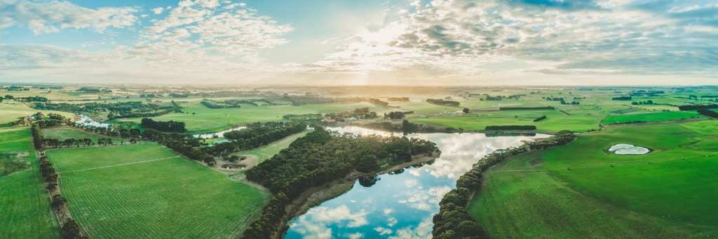 Grasslands along the Hopkins River in Warrnambool, Victoria. Victoria Mountains