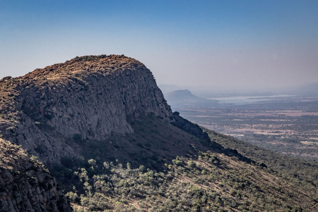 Views of acacia scrubland and highveld from the Magaliesberg Mountains. West Rand District