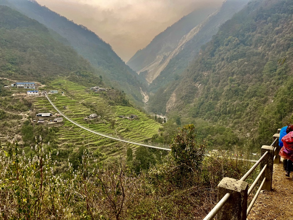 Along with roads and footpaths, colossal suspension bridges are a normal part of daily transport for the Nepalese. Photo: Conrad Lucas. Western Development Region