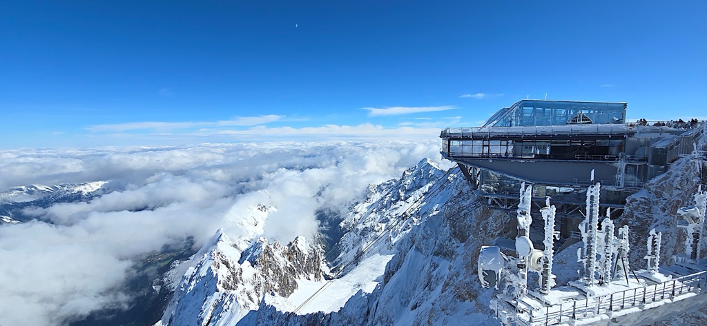 Zugspitze’s summit features the top stations of no less than three cable cars, making it accessible from all sides of the mountain. You’ve got the Gletcherbahn, the Zugpitzebahn, and the Seilbahn Zugspitze; the latter, a cogwheel train, travels almost 2000 m (6,600 ft) from valley to summit. Wetterstein