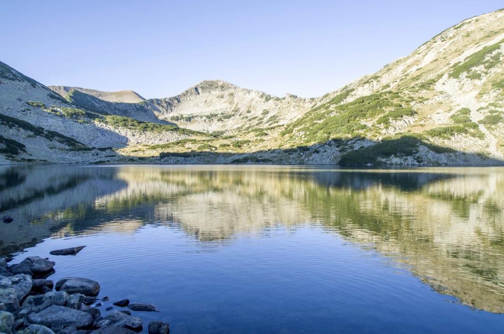 Many peaks have a cirque feature, as well as a glacial lake at the base (Kremensko Lake), the product of periods of intense glaciation and melting. Yulen Reserve