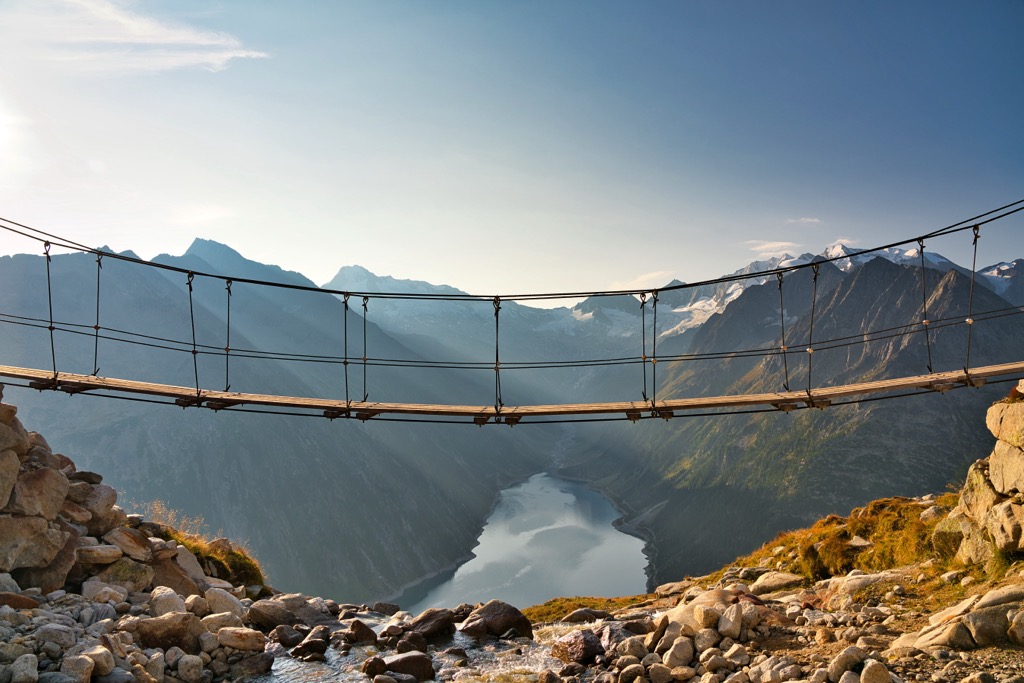 The famous suspension bridge overlooking Schlegeisspeicher. Zillertal Alps