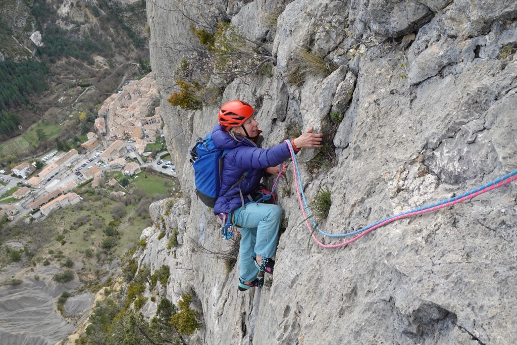 Climbing on the limestone cliffs above the village of Orpierre, France